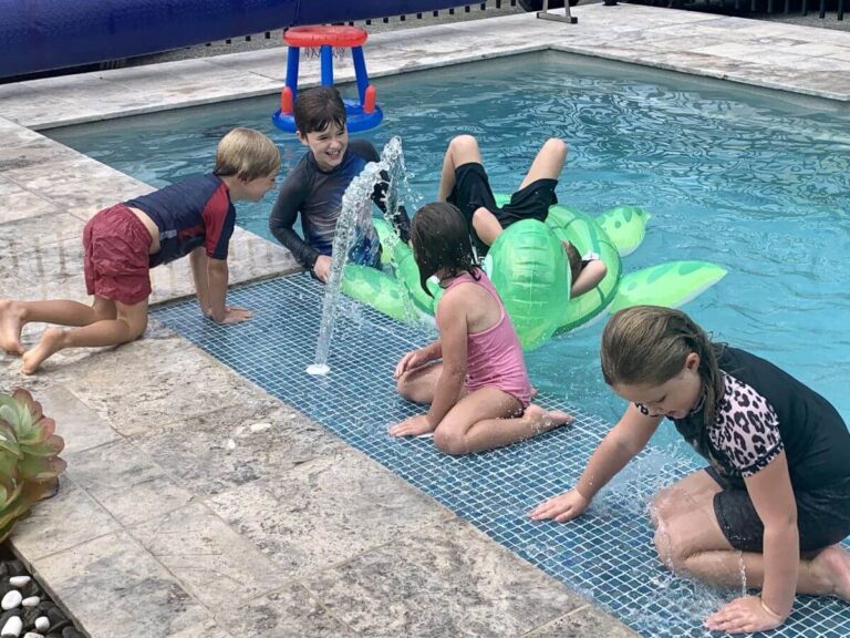 Kid-Friendly Backyard Oasis: 7 Essential Features for Pool Design for Kids